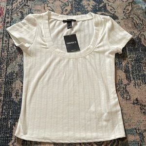White short sleeve fitted top. From forever 21. Never worn with tag.